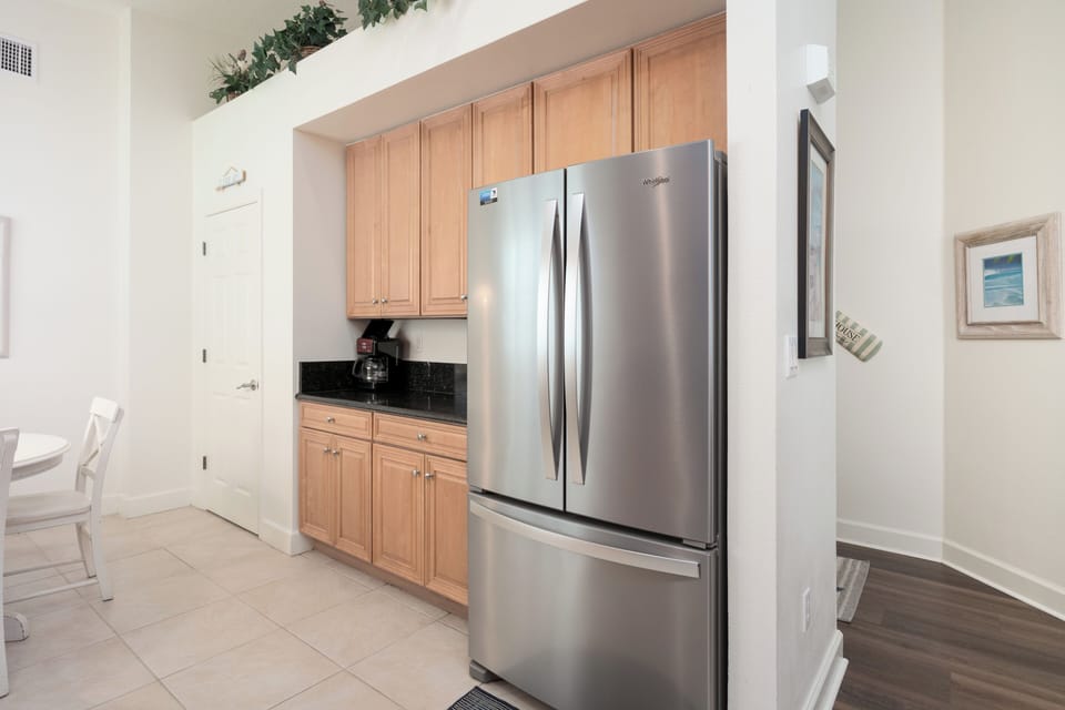 Brew your coffee every morning with the coffee pot in the kitchen.