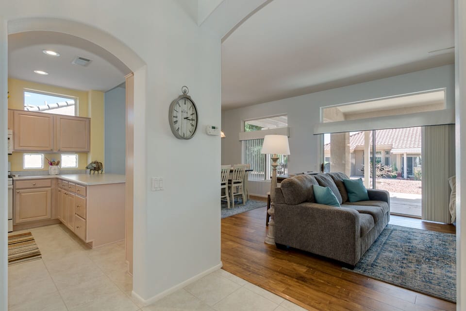 Enter into open living; either into the kitchen or living area!