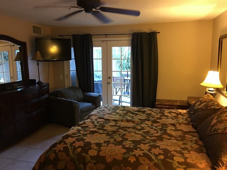 Master Suite with ensuite master bathroom. King size bed with flat screen tv.