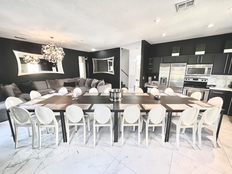 Private Dining Room with your entertaining private chef dinners with Philip Starck designed chairs for exclusive sit down dinners for up to 20 persons inside and 16 persons outside overlooking private pool & golf. Then sip on a cocktail at Fire Pit.
