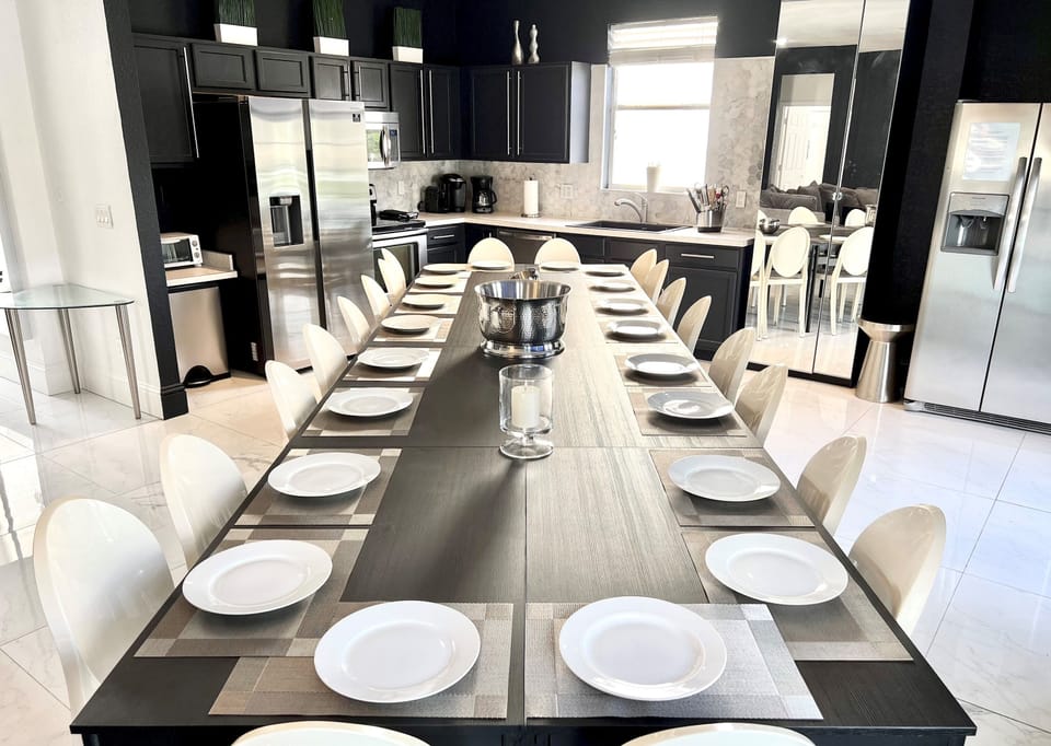 Private Dining Room with your entertaining private chef dinners with Philip Starck designed chairs for exclusive sit down dinners for up to 20 persons inside and 16 persons outside overlooking private pool & golf. Then sip on a cocktail at Fire Pit.
