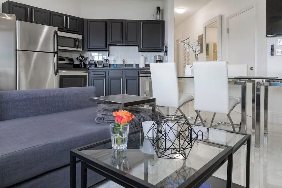 Experience the perfect fusion of entertainment and dining in the living room, designed to provide a seamless space for social gatherings.
