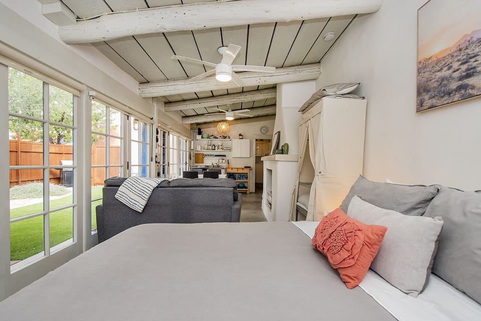 Comfy Queen size bed at the end of the unit