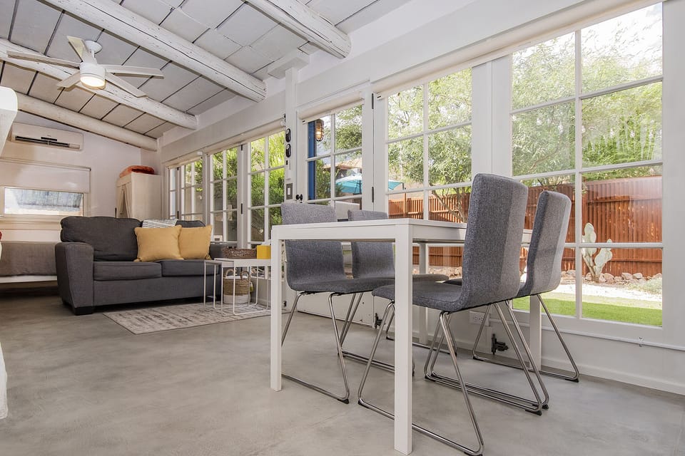 Dining table seats four and  extends for more dining / work space