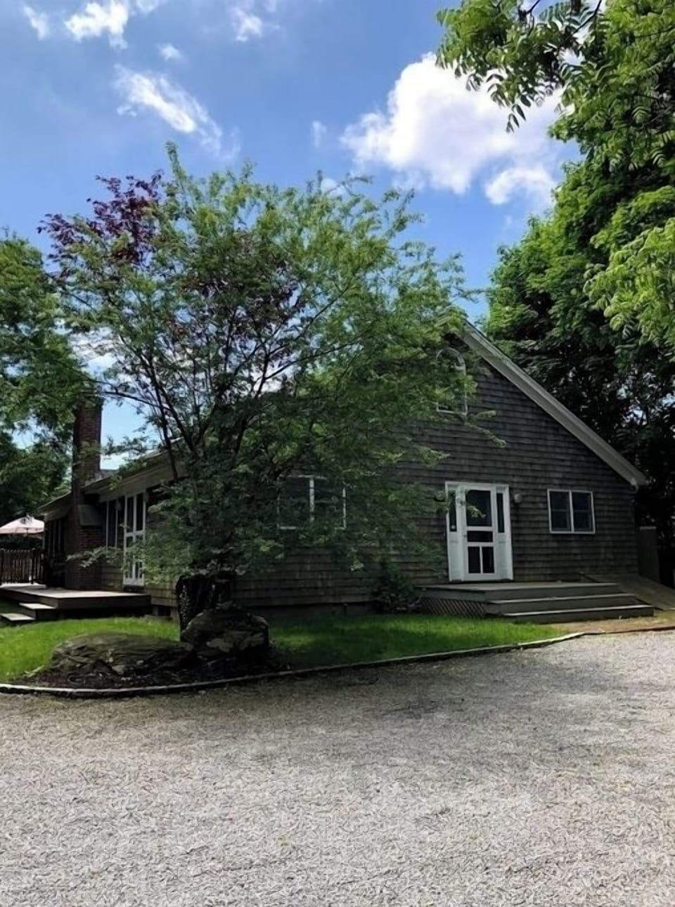 Front of the house, long driveway provides privacy from the road