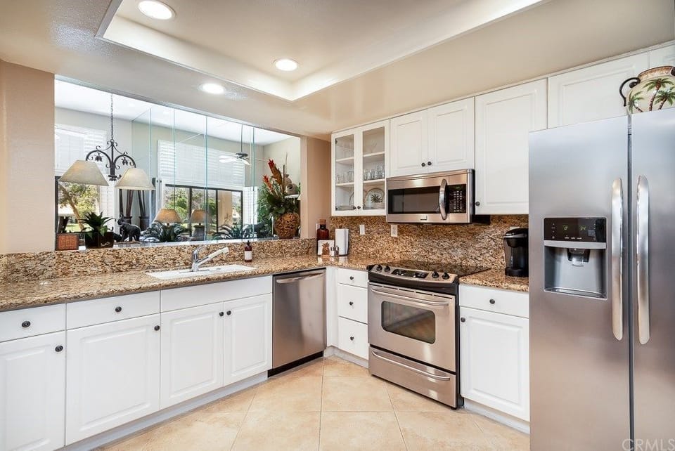 Enjoy the view while cooking. Separate bar cabinet in kitchen