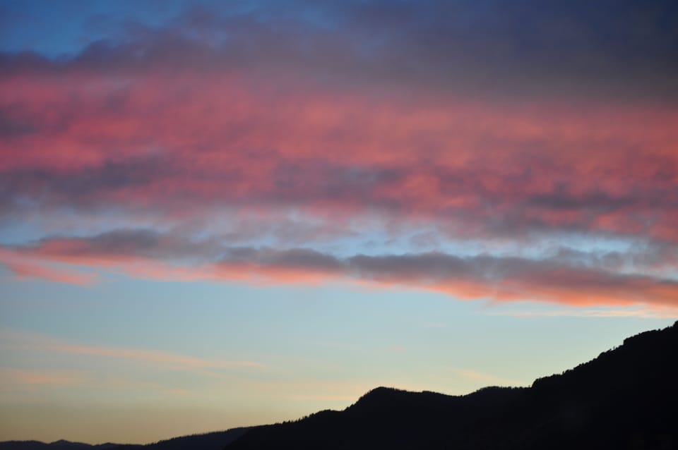 Beautiful western sunset from the condo looking at Rendezvous Mountain