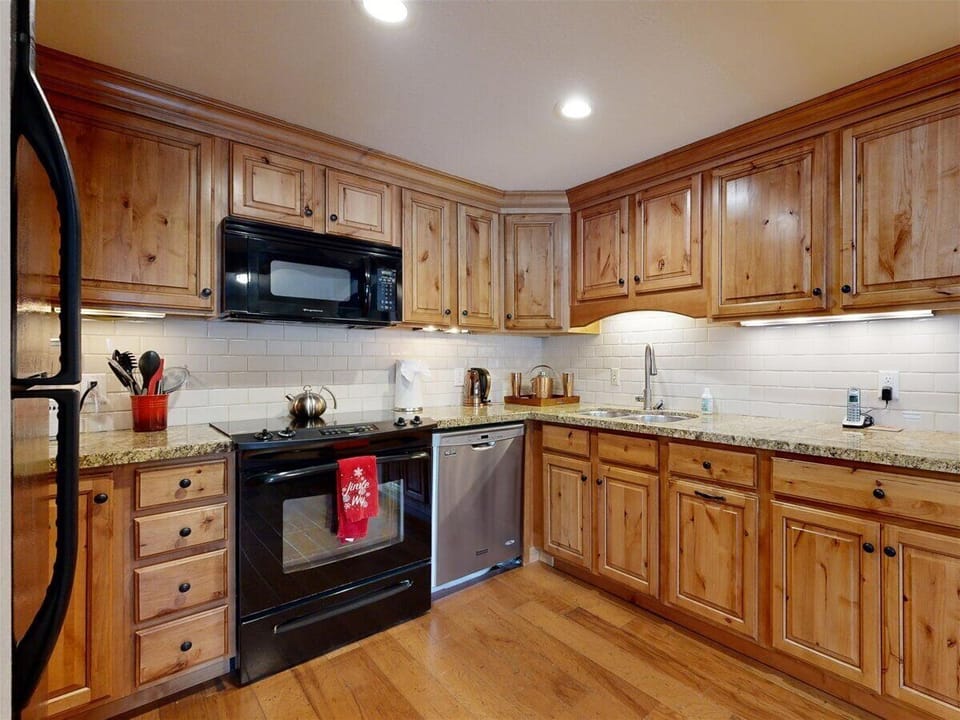 Kitchen equipped to prepare a meal or have a cup of coffee. Well stocked 