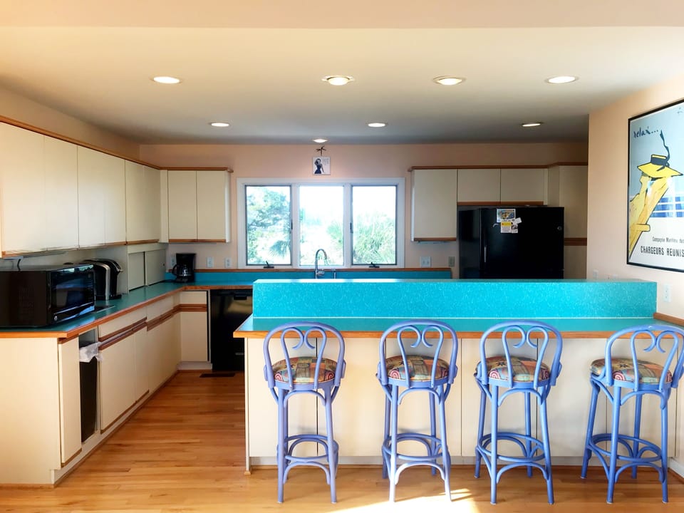 Spacious kitchen with bar seating