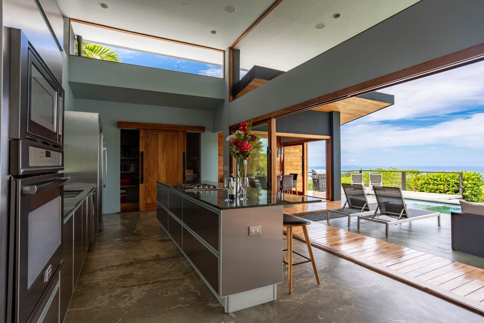 Fully stocked kitchen, with adjoining pantry and laundry room.