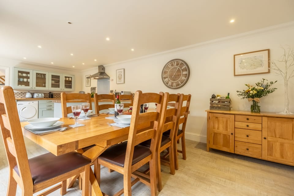 Ground floor: Dining area with seating for eight people