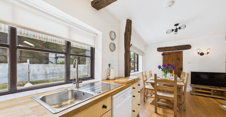 Thoughtfully stocked for a self-catering farm stay, featuring ample counter space and high-end small appliances.
