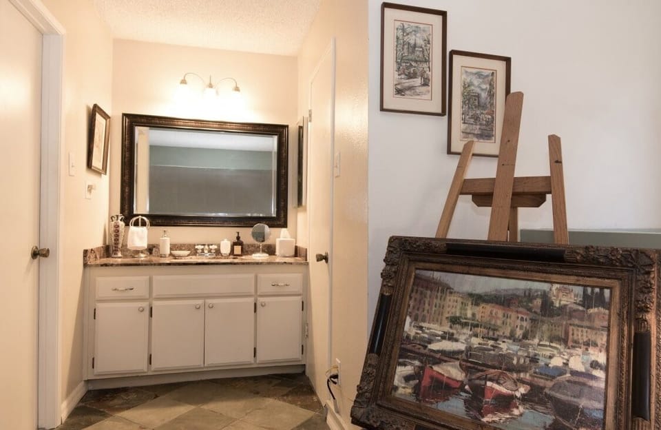 Upstairs Bathroom has walk in closet (you can see the closed door on the right)