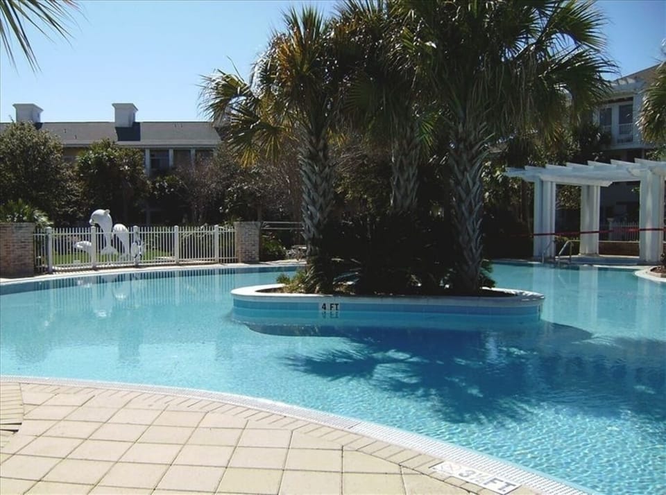 Pool is on top of the garage, yet has the best gardens.