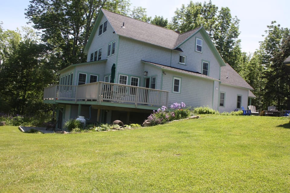 Large back yard with no visible neighbors. Over looking Acadia National Park.