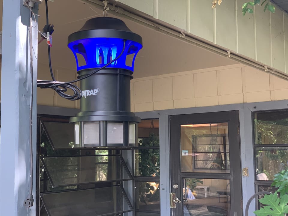 Back door  mosquito trap - covers 1 acre 
No more mosquitoes around 