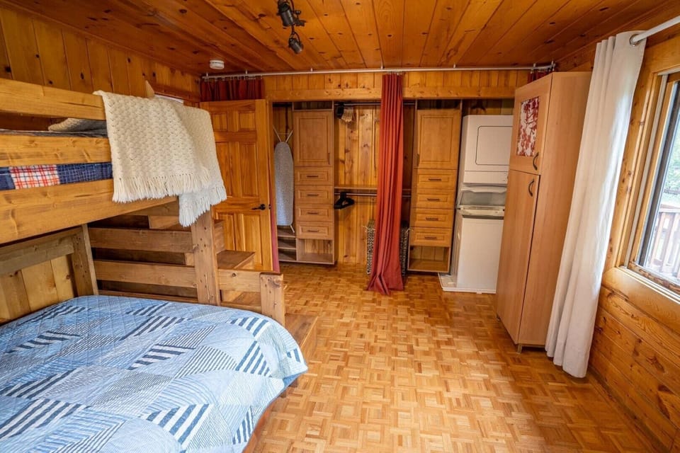 Main floor - bedroom with large closet and laundry.