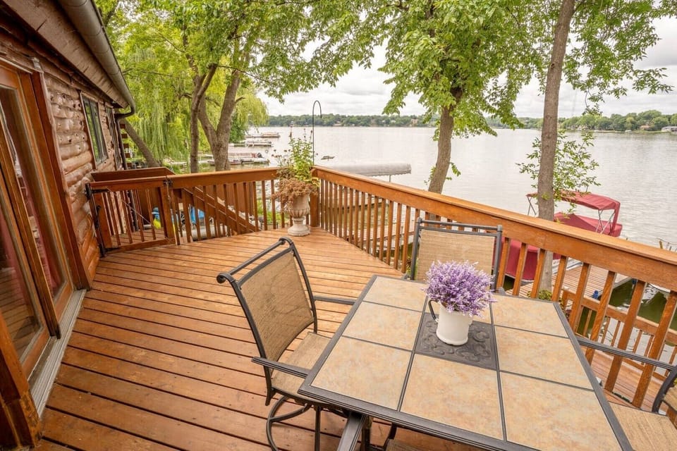 Deck off of the living room and dining room overlooking the lake.