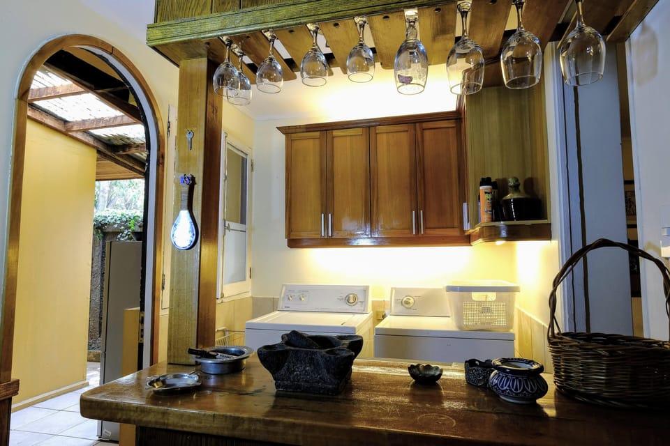 Bar, laundry and second refrigerator.