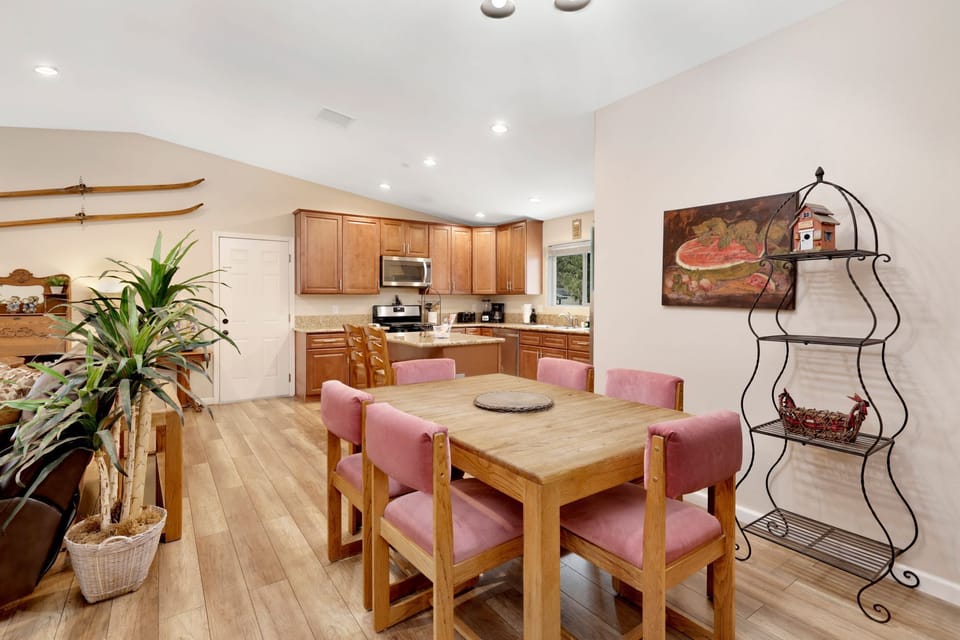 Inviting dining area designed for comfort and connection. The space feels open and airy, with a warm atmosphere that makes everyday meals and special gatherings equally enjoyable.
