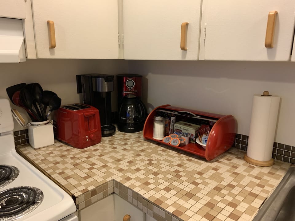 Updated coffee corner! There is also a crock pot, electric fry pan and griddle.