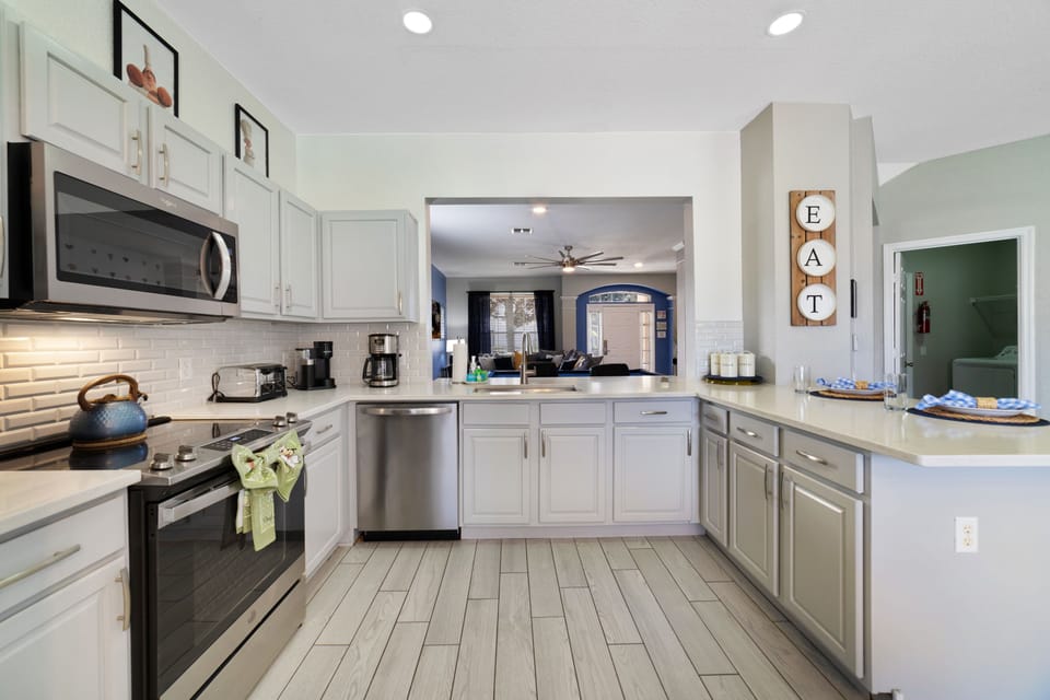 Kitchen with new appliances and kitchen appliances, including an R2-D2 instapot.