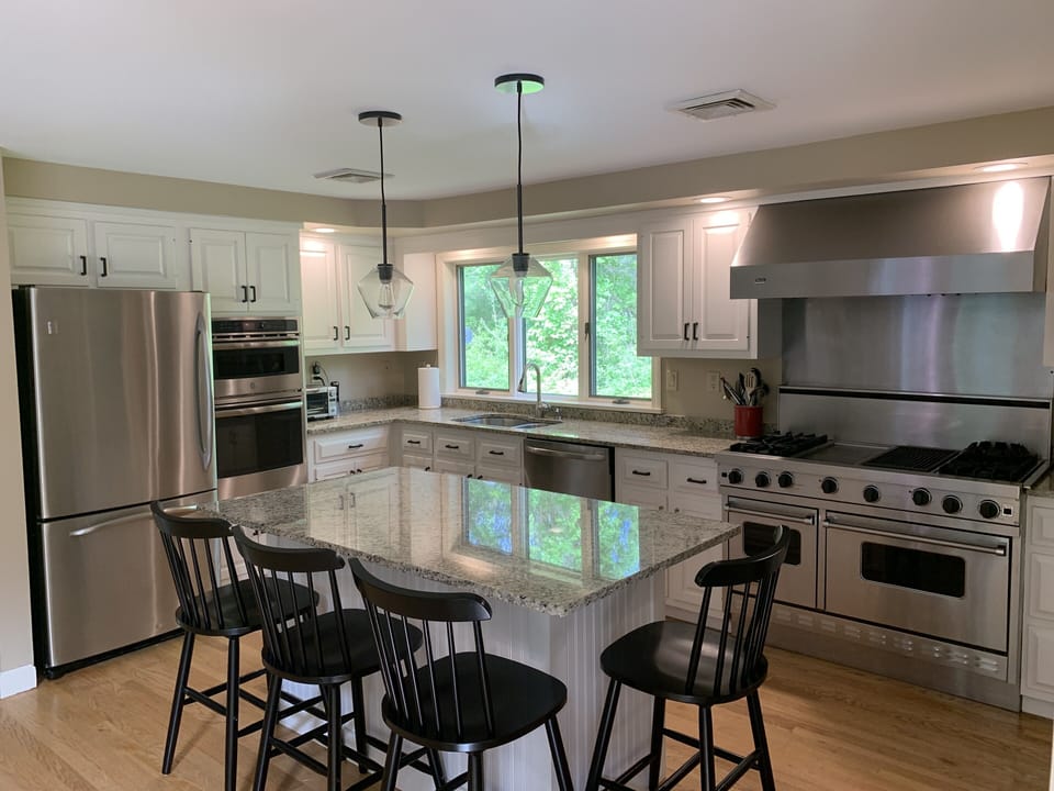 Eat in kitchen with stainless steel appliances including Viking  chef’s stove