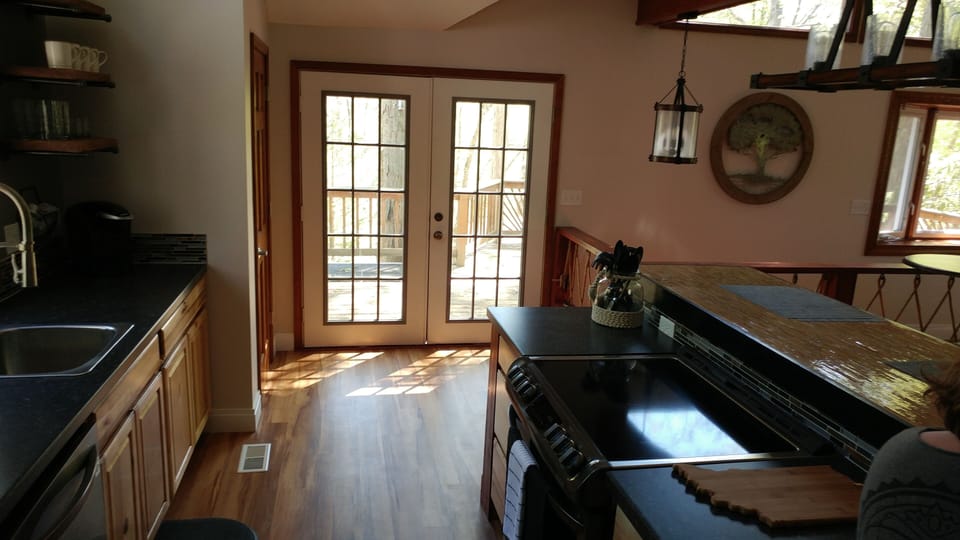 Access to the balcony is right off the kitchen!