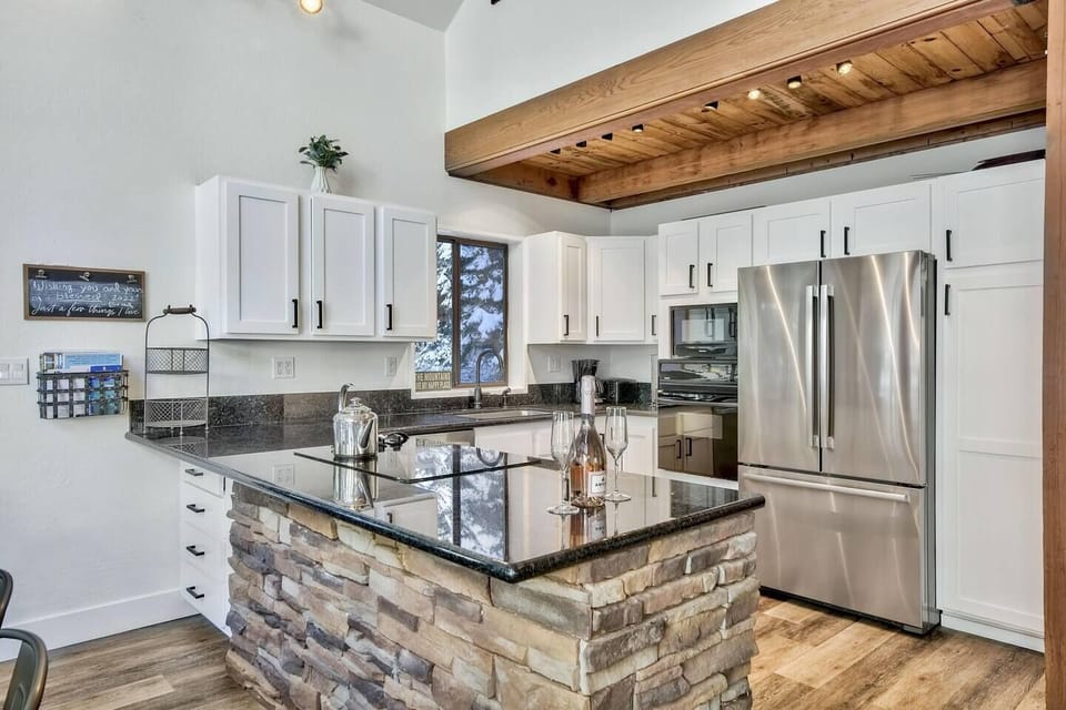 Enjoy a full kitchen w/ modern appliances, stocked with all the essentials for a seamless stay — Keurig coffee maker, tea kettle, dish soap, cleaning supplies, dishwasher pods, Alexa music, and everything you need to cook and dine with ease. 