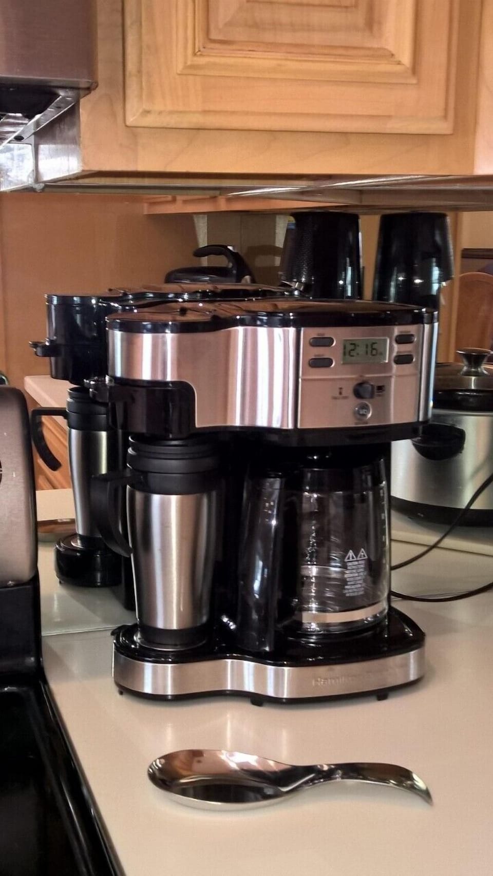 Coffee Maker brews single serve or full carafe