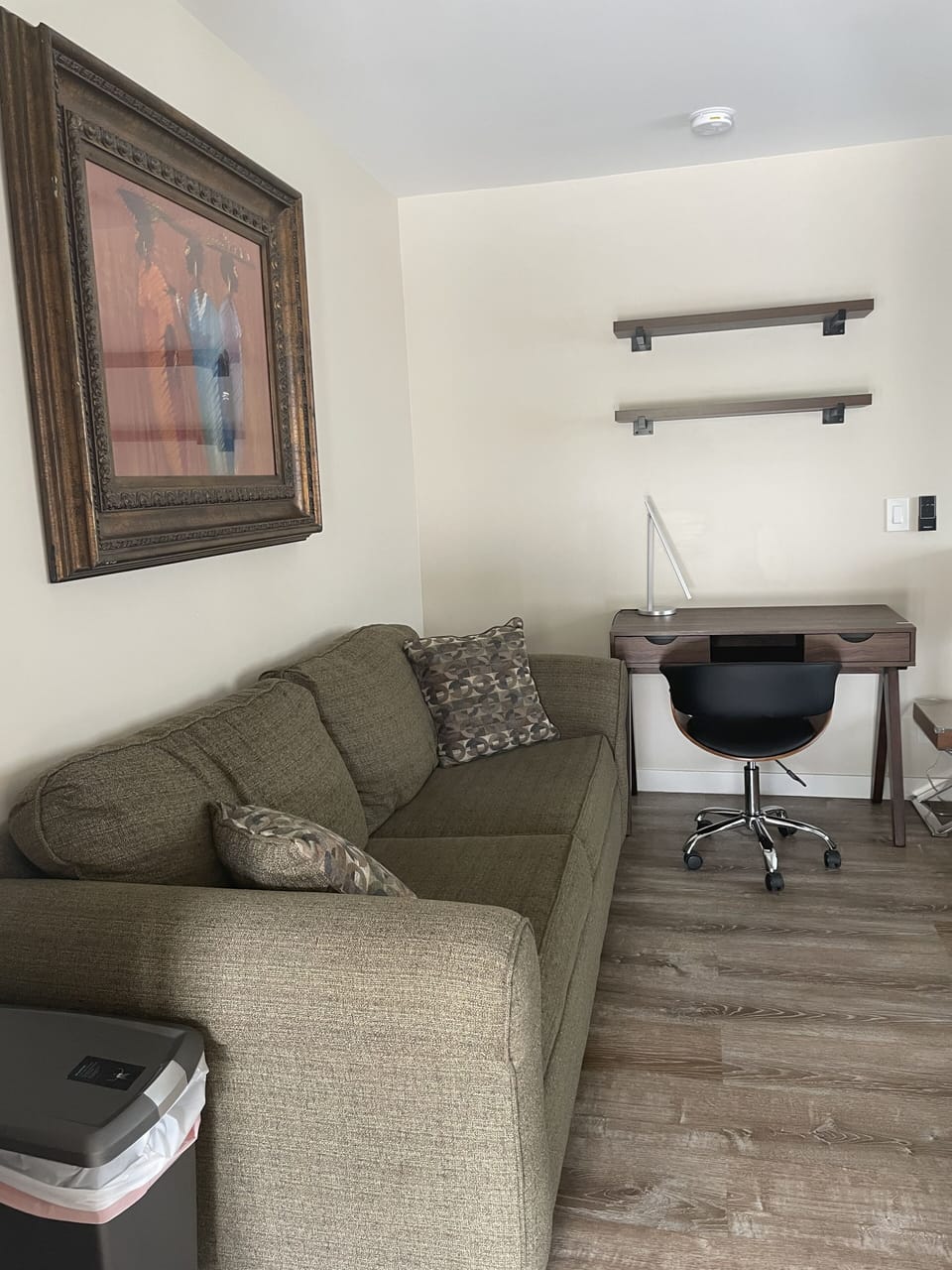 Couch and desk area. 