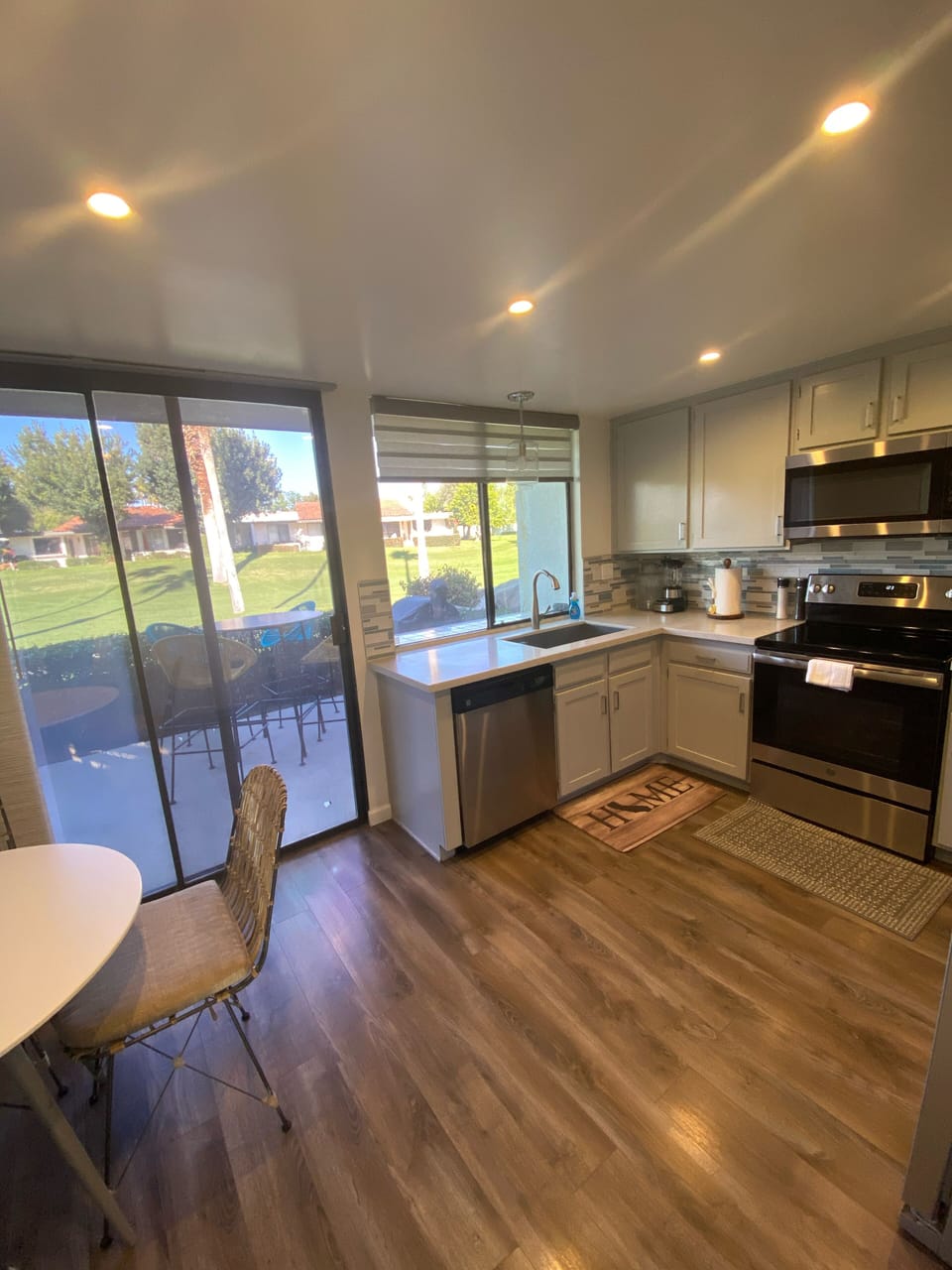 Kitchen looking out to back patio on golf course
