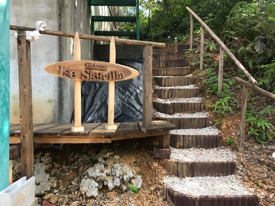 Up the stairs is the entrance