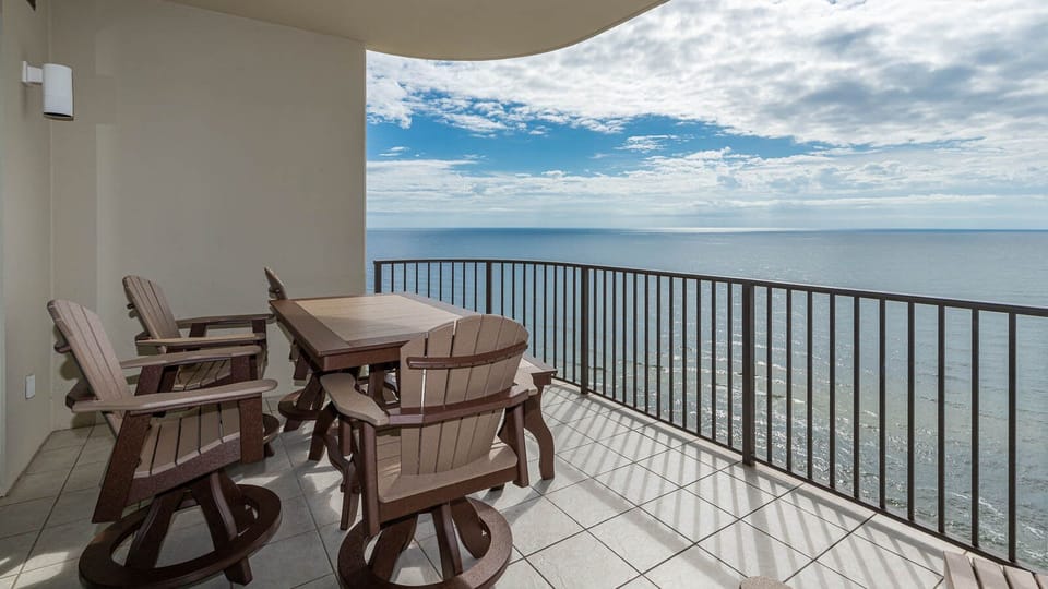 Relax on your balcony and bask in the sunlight with mesmerizing views of the gulf coast on your beach retreat
