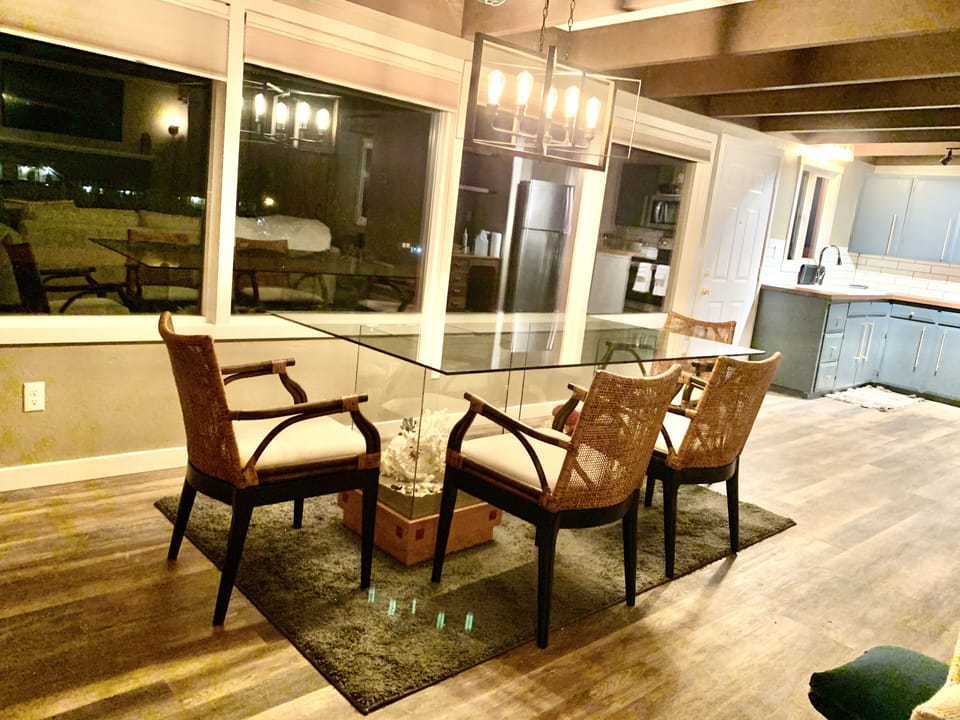 Large glass dining table w/ beautiful coral collection. seats 6 . Ocean views