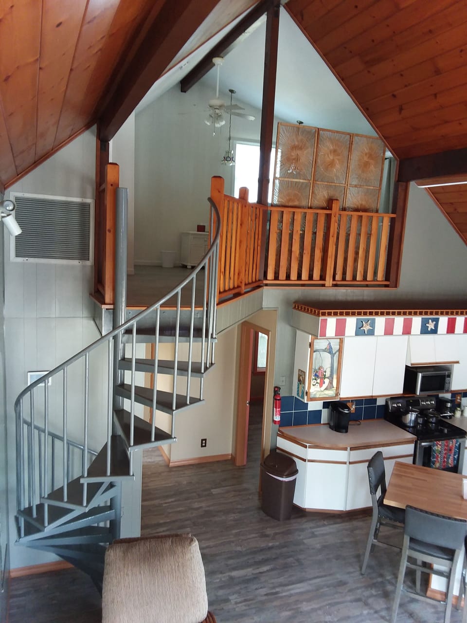 The spiral steps and loft, viewed from the Livingroom area.