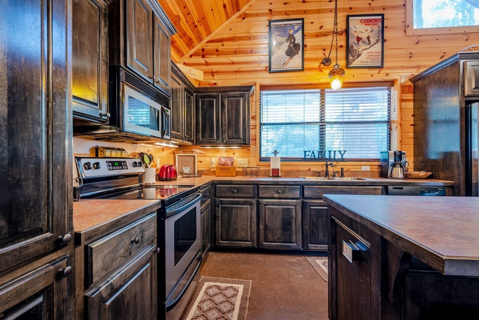 Fully stocked cabinets with dishware and cookware