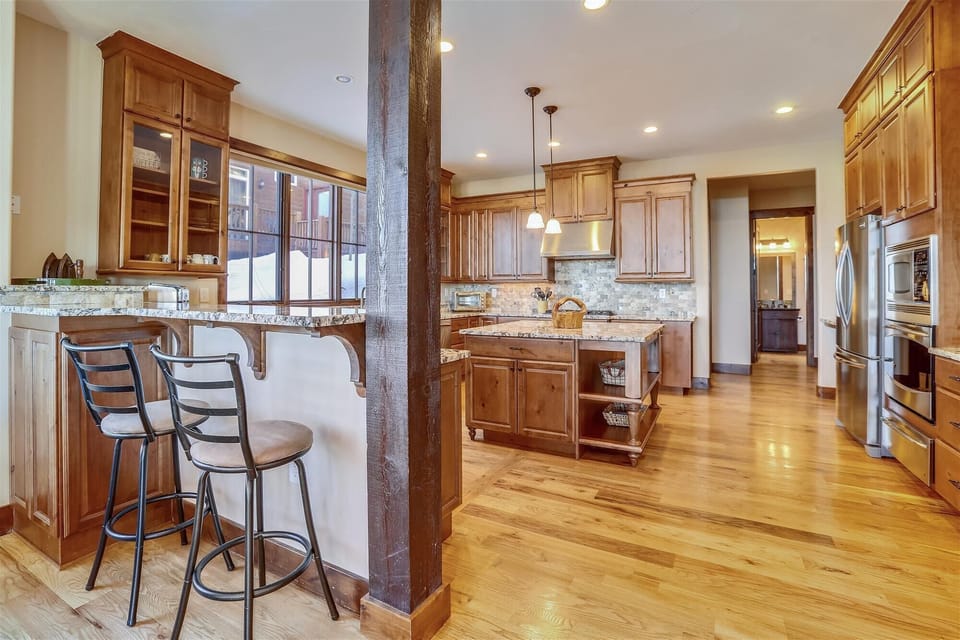 View into kitchen from dining area - Baldy Mountain Overlook Breckenridge Vacation Rental