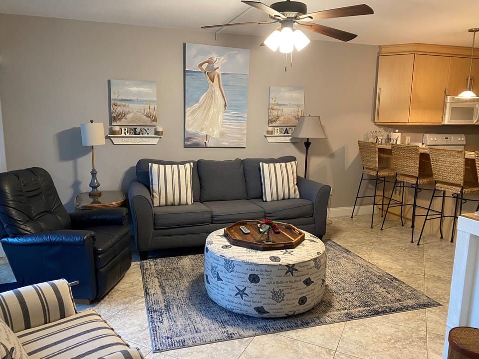 Living room with new, comfy sleeper sofa with high-end gel mattress.