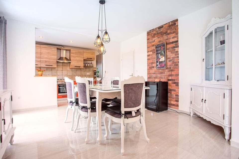 Dining area is connected with fully equipped kitchen.