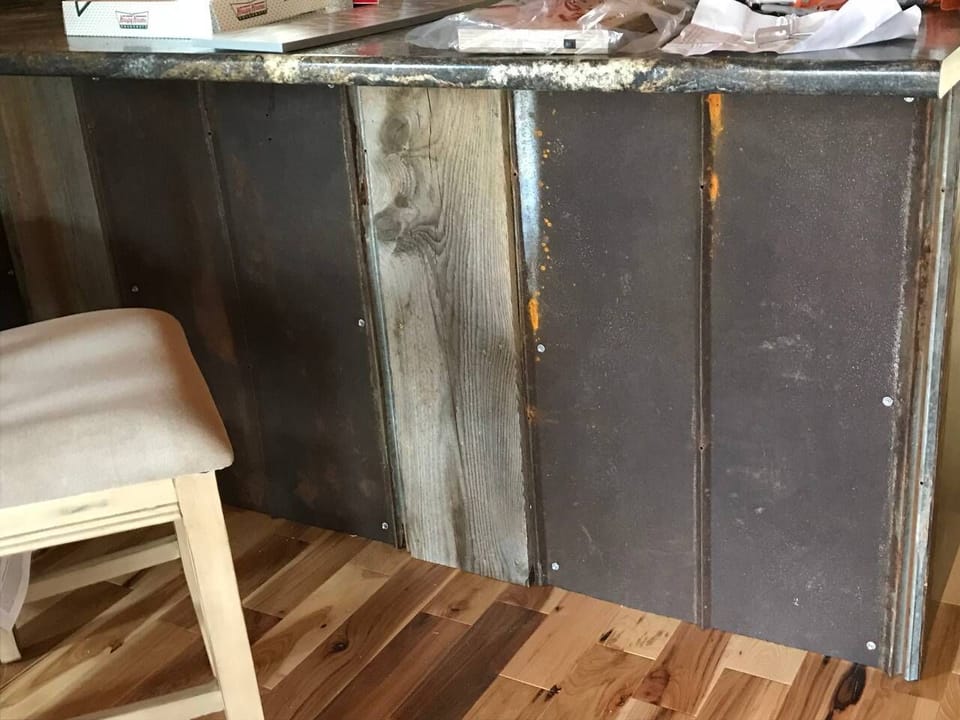 Tin and barn wood under bar