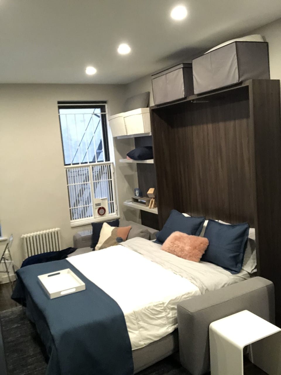 Pull down Murphy bed.
