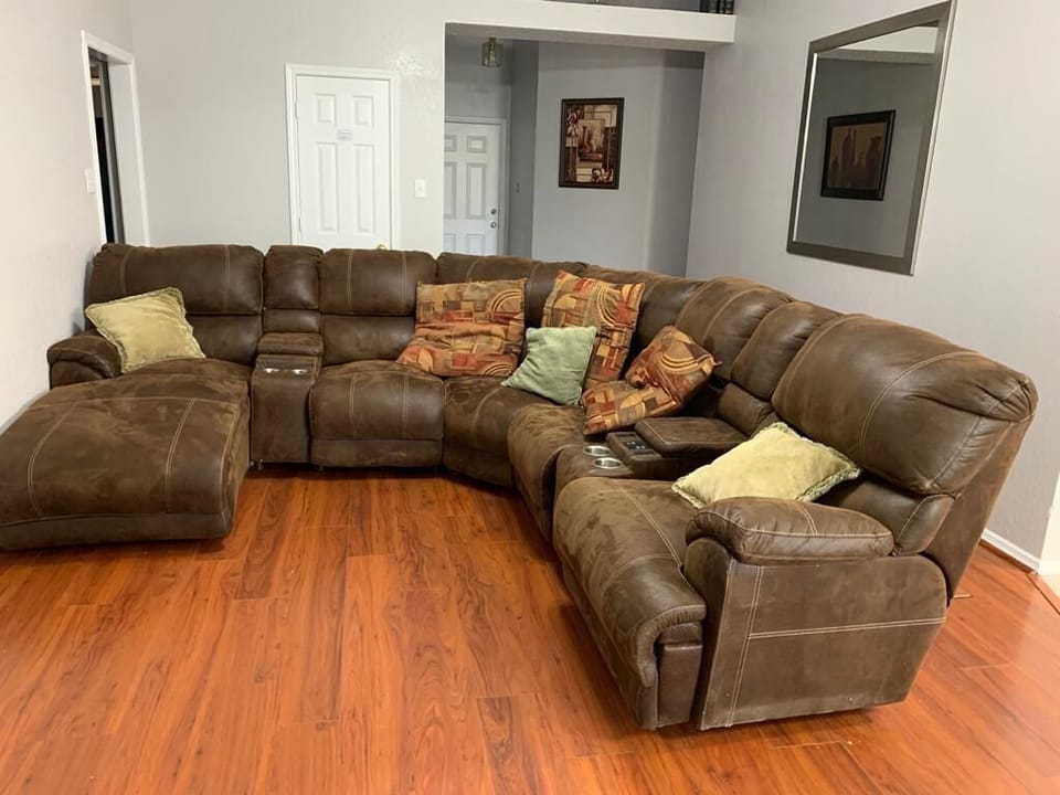 Sectional reclines and has massage feature. Reading lights in arm rests