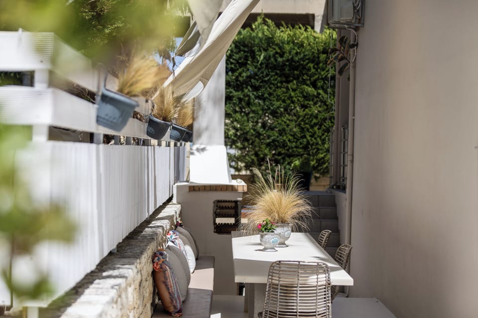  Enjoy a culinary delight in the outdoor dining space.