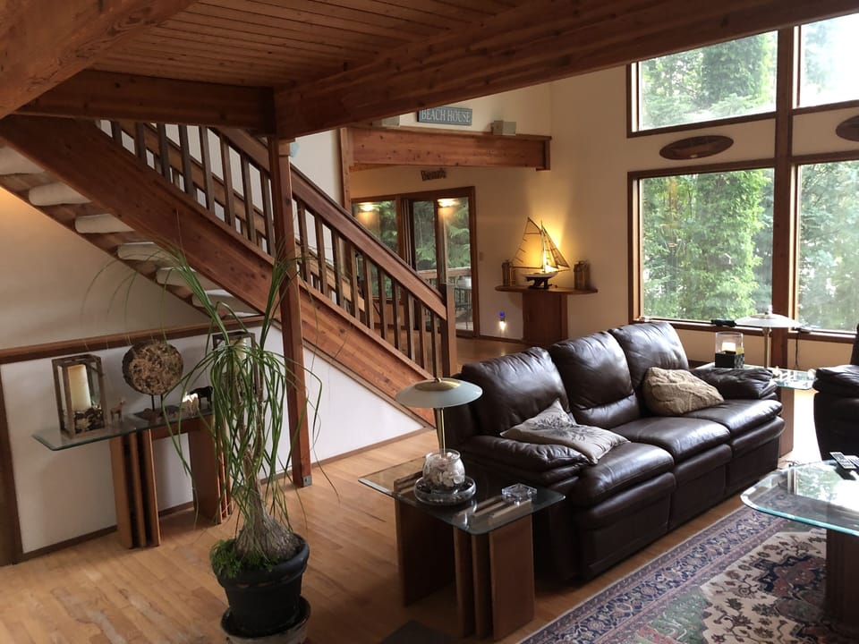 Living room, stairway to master bedroom.