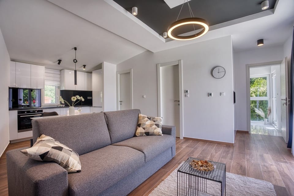 a fully equipped kitchen, dining area, a living room with a sofa (that converts into a sofa bed), TV, free WiFi, A/C