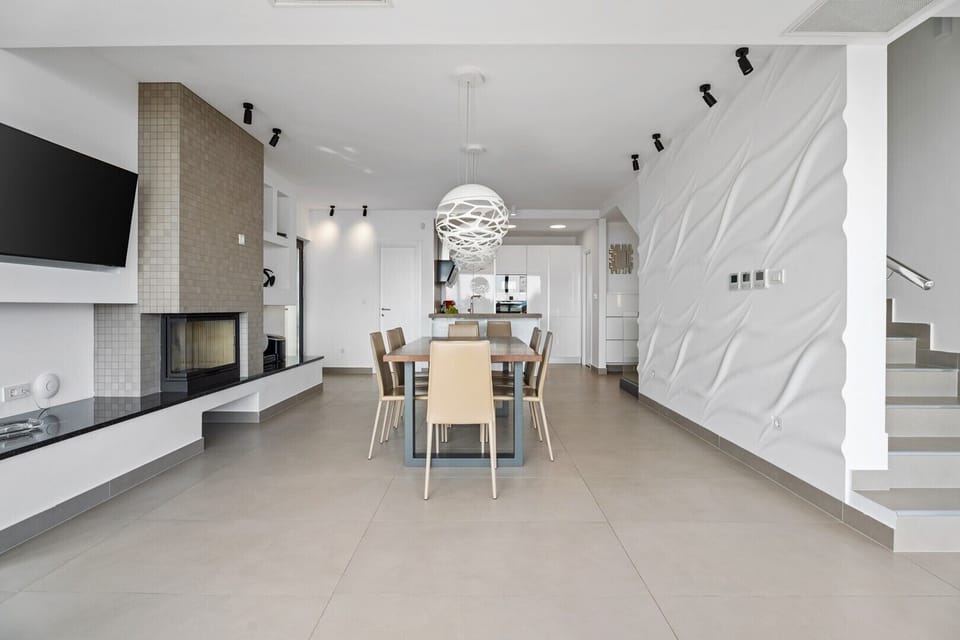 Spacius living and dining room with an open sea view