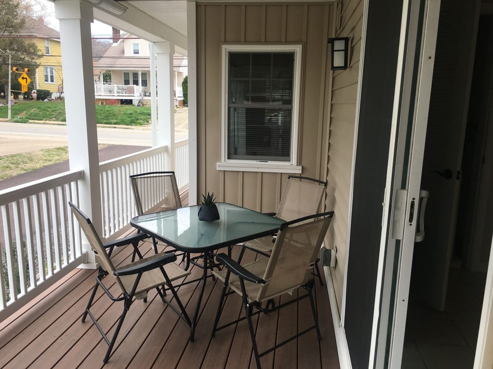 Covered deck with table and chairs