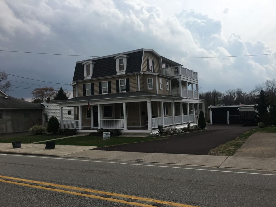 Apartment is located on the ground floor of this restored farmhouse.
