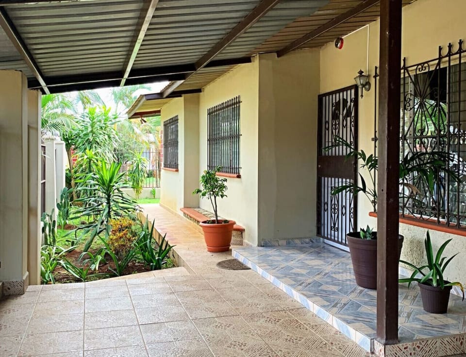 Gated Front Entrance with Lush Landscaping.